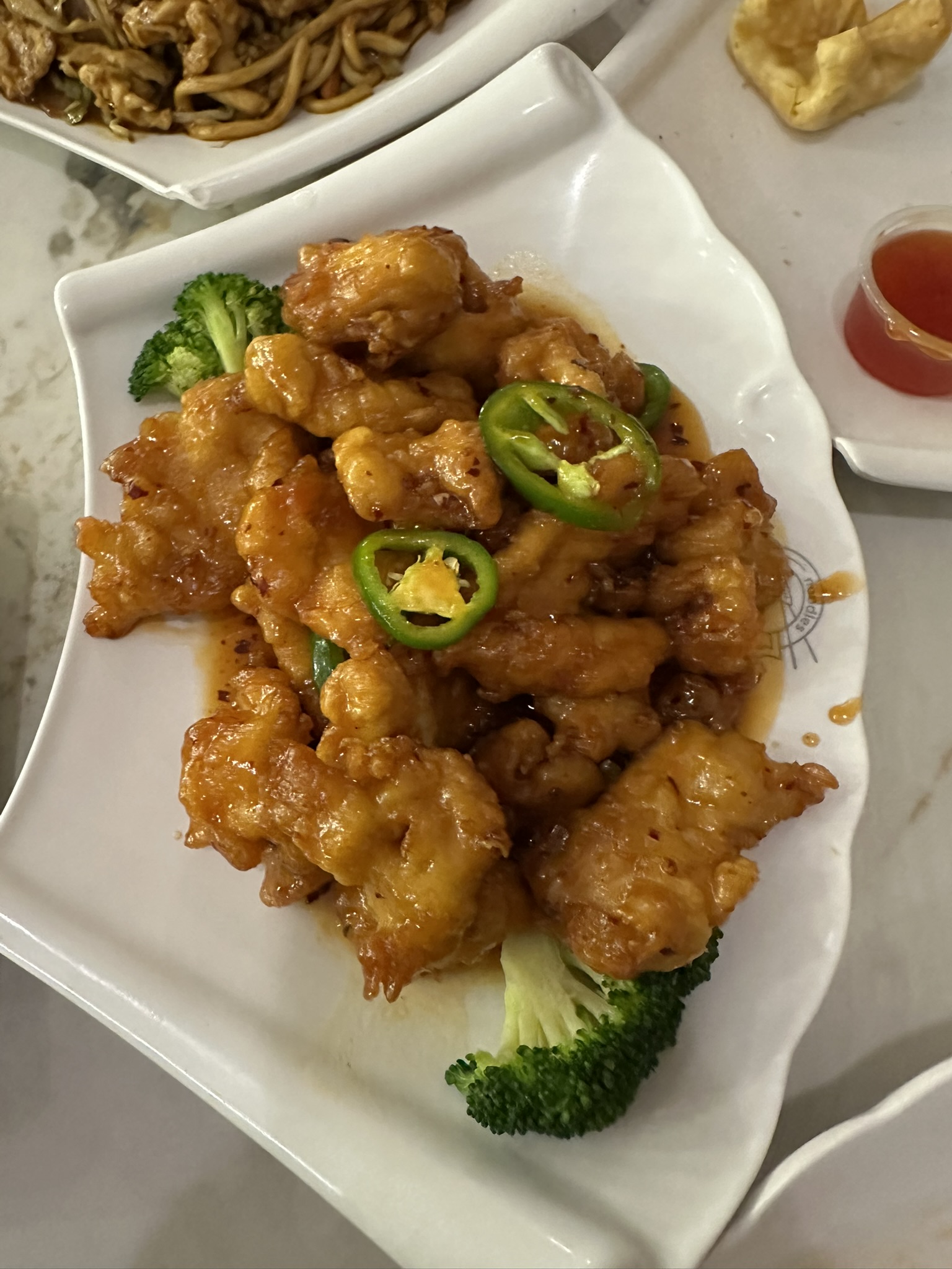 Spicy fried chicken with jalapeños, photographed during a real Eatography visit — no stylist, no studio